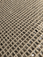 Close-up of Chillybuddy's woven cotton mesh fabric in a light beige color, showing the detailed texture of the threads.